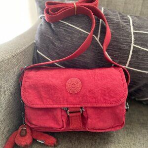 Like new Kipling smart crossbody bag color rich red